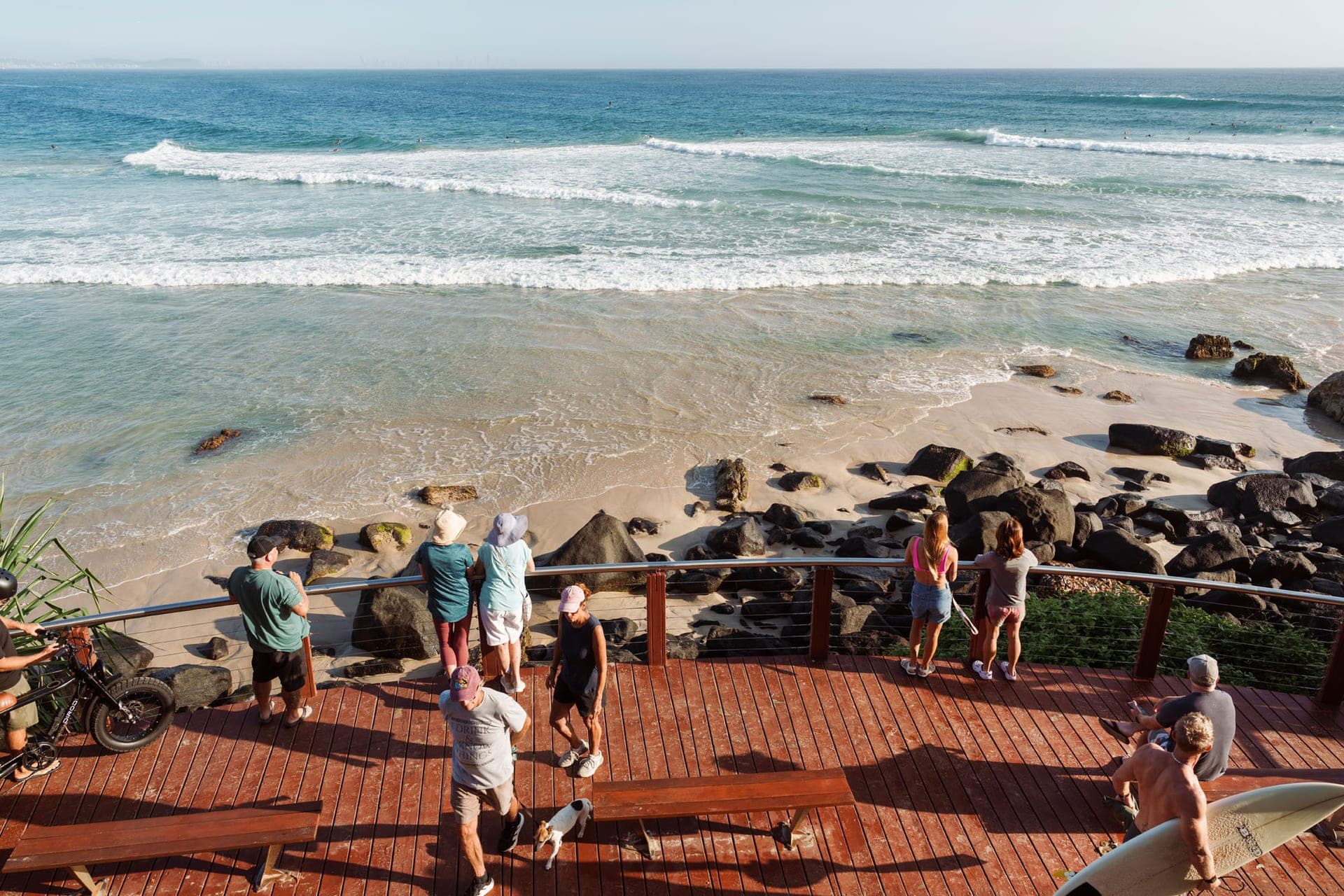 People watching the surf from the Coolangatta headland lookout